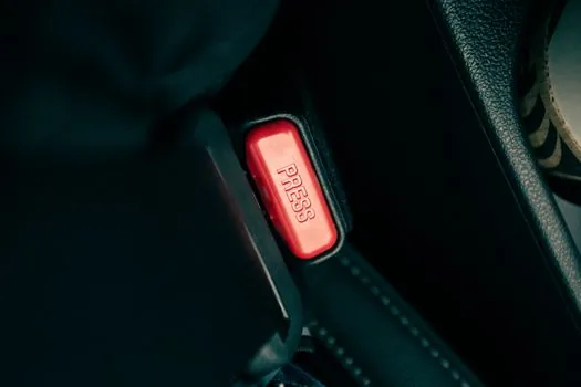 car seatbelt buckle anchor close up safety mechanism