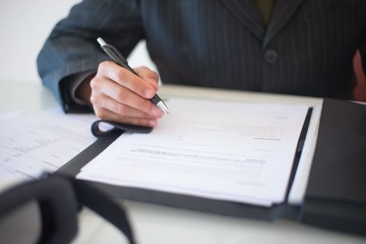 finance contract document comparison business desk
