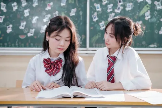 Korean high school student studying books uniform classroom