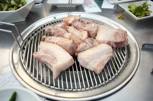 Korean pork belly samgyeopsal charcoal grill close up food
