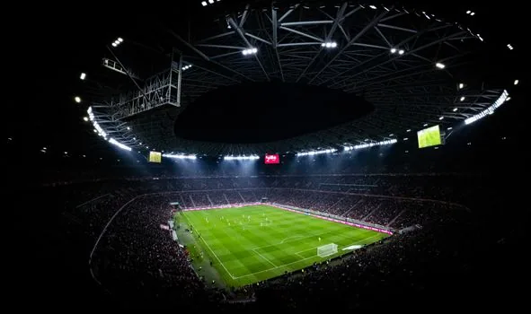 soccer stadium floodlights world cup match night atmosphere