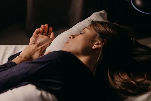 woman sleeping well comfortable bedroom night rest