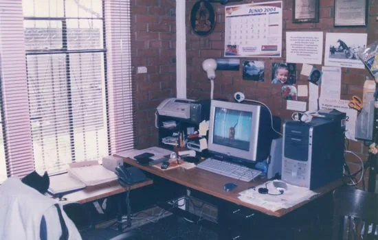 flatbed scanner checking certificate barcode at public office desk