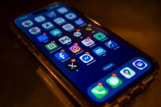 Korean person checking Naver app certificate notification permissions on smartphone, realistic close-up home table, no logo text