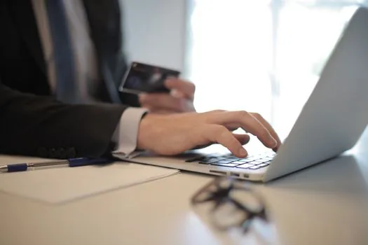 person checking certificate password and expiration date on laptop