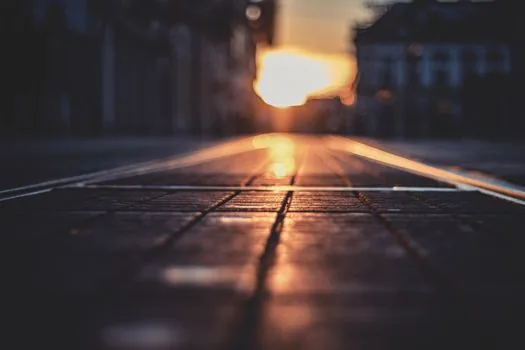 symbolic SNS comment thread with warm reply notification and blurred city morning