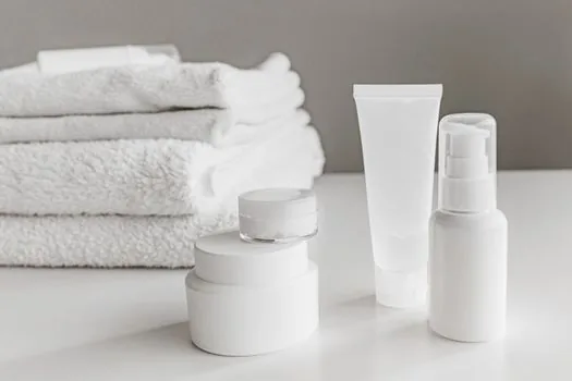 clean bathroom shelf with mild cleanser moisturizer and fresh cotton clothes after summer shower, Korean home, realistic photo, no brand logos