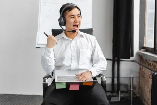 browser open app permission popup for video meeting link on laptop with meeting email and headset nearby, realistic Korean home office, no readable private text | 회의 링크 실행 팝업을 확인하는 장면