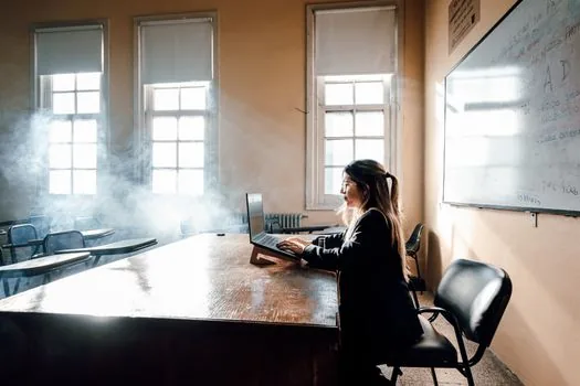 Korean student watching foreign language YouTube lecture on laptop and opening subtitle settings, bright study desk, no readable brand logos | 노트북에서 YouTube 자막 설정을 여는 장면