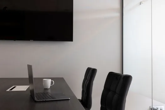 a Korean TV entertainment production meeting table with printed travel itinerary notes boarding pass props and soft morning newsroom light, editorial photography, no logos, no text