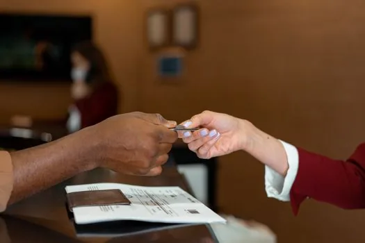 hospital reception counter with certificate request form and pen