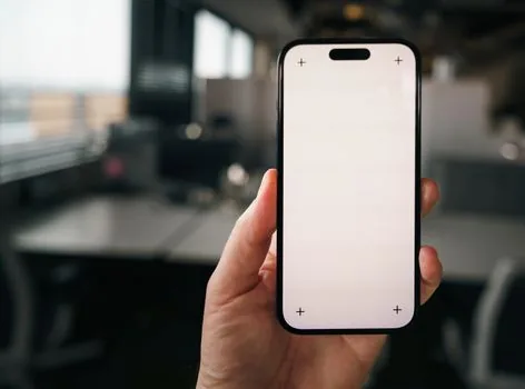 person checking mobile identity app checklist before visiting Korean driver license office, phone and license on desk, realistic photo
