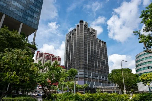Korean company owner organizing financial statements, customer list and succession memo before M&A support application, realistic office photo | M&A 지원 상담 전 재무제표와 거래처 자료를 정리하는 장면
