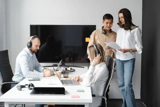 Korean consumer calling help center with travel refund documents and laptop open | 1372 소비자상담센터 문의 전 자료를 준비하는 장면